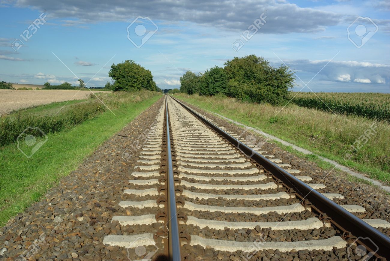 Railway Tracks On Background Of Scenery Stock Photo, Picture And