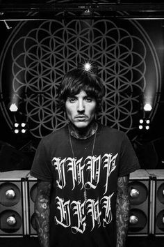 Oli Sykes in a flower crown   and I thought he couldn't get any